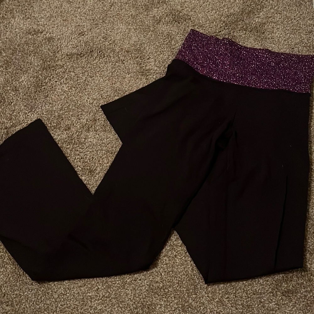 Black lululemon yoga pants with purple waistband